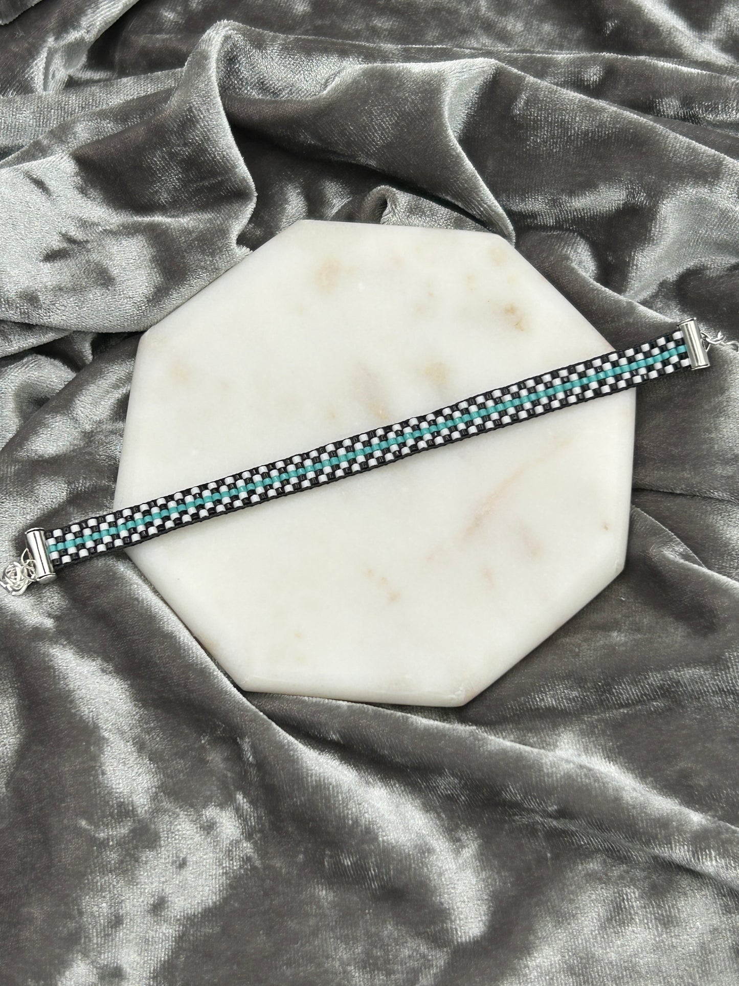 Checkered and teal bracelet