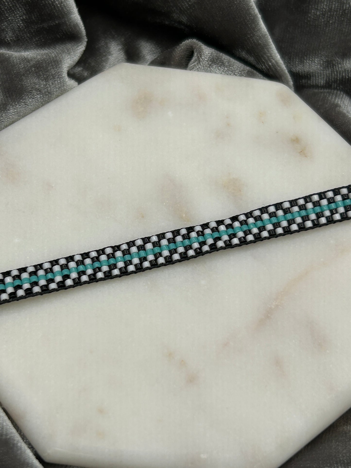 Checkered and teal bracelet