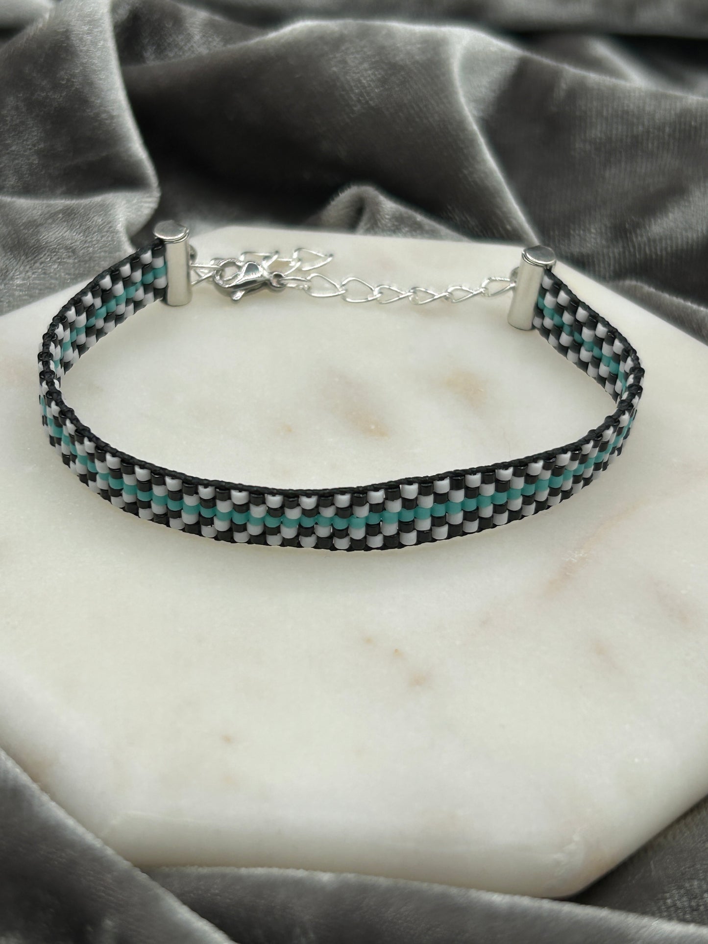 Checkered and teal bracelet