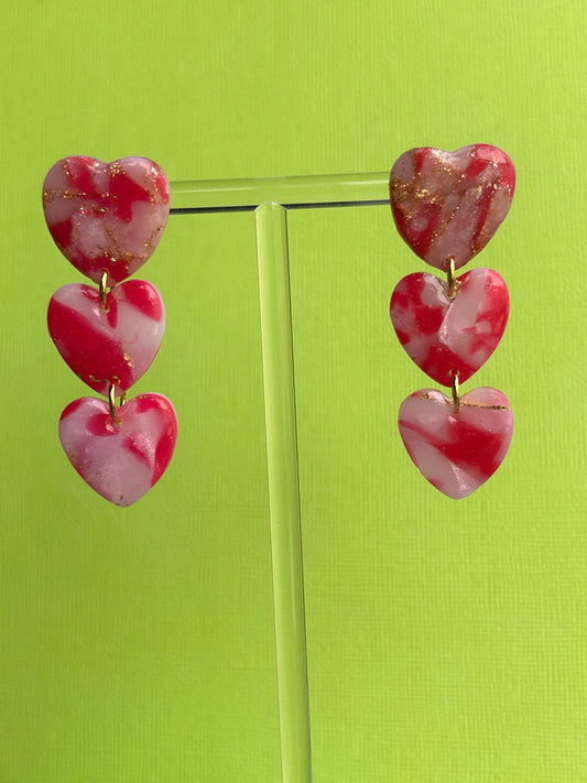 Pink marbled triple heart dangles